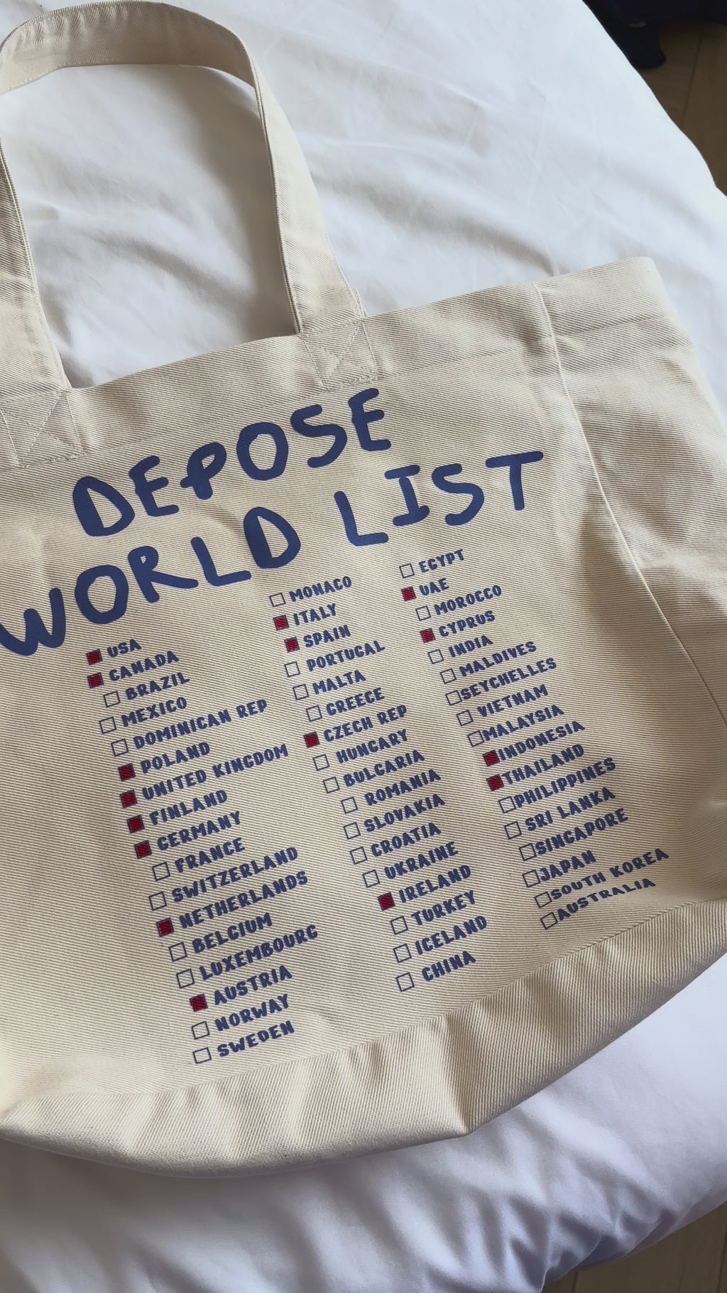 Duża torba z drelichu bawełnianego z listą krajów do odhaczania i napisem DEPOSE